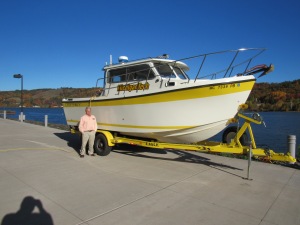 Dr. Guy Meadows with one of Michigan Tech's smaller research vessels.